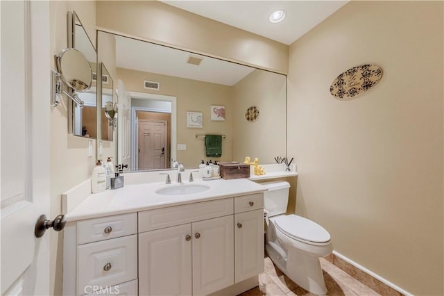 2551 Holly St, Fullerton, CA 92835 - bathroom with toilet, vanity, tile patterned flooring, and baseboards