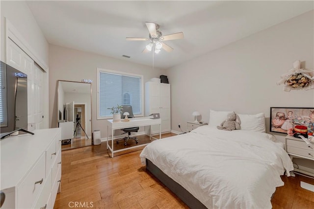 2551 Holly St, Fullerton, CA 92835 - bedroom with light wood-style floors, an office area, ceiling fan, baseboards, and a closet