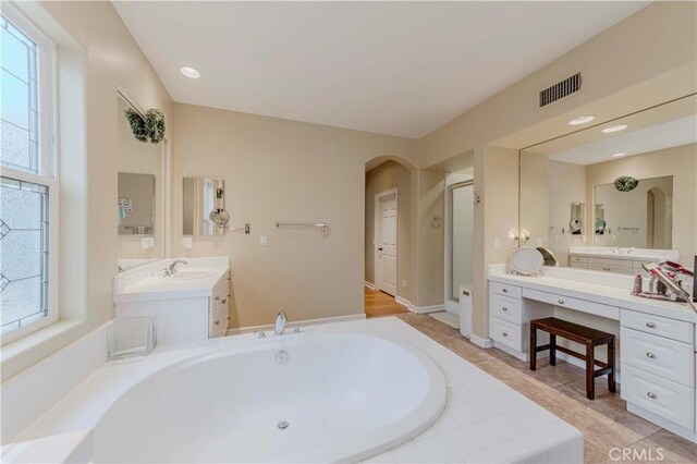 2551 Holly St, Fullerton, CA 92835 - full bathroom featuring a bath, a stall shower, and vanity