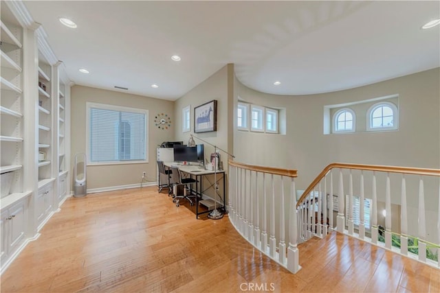 2551 Holly St, Fullerton, CA 92835 - office featuring light wood-type flooring, built in shelves, recessed lighting, and baseboards