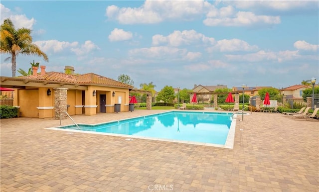 2551 Holly St, Fullerton, CA 92835 - community pool with a patio area and fence