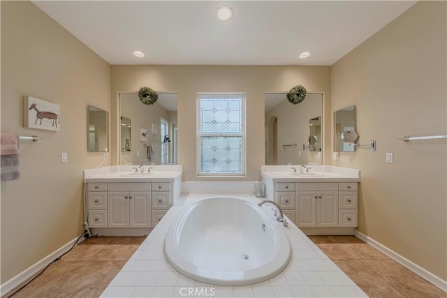 2551 Holly St, Fullerton, CA 92835 - full bathroom with two vanities, a garden tub, tile patterned floors, baseboards, and recessed lighting