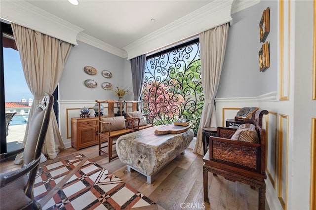 2825 Majestic St, West Covina, CA 91791 - living area featuring hardwood / wood-style floors, crown molding, and a wainscoted wall