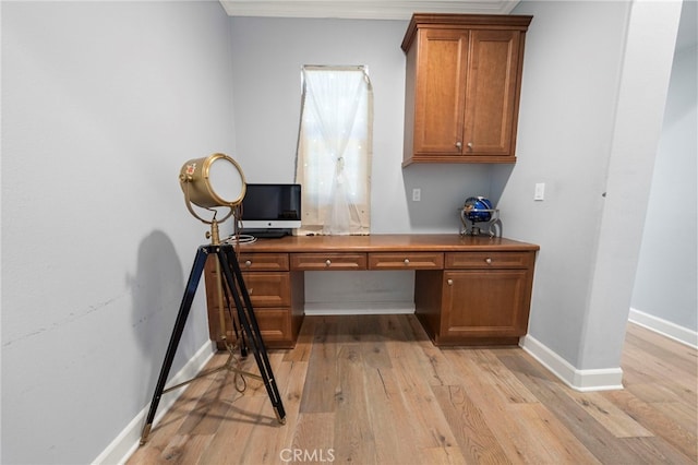 2825 Majestic St, West Covina, CA 91791 - office space with light wood finished floors, crown molding, baseboards, and built in desk