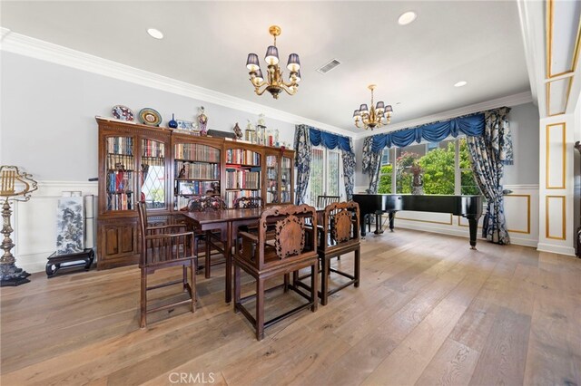 2825 Majestic St, West Covina, CA 91791 - dining area featuring a chandelier, wood-type flooring, a wainscoted wall, ornamental molding, and recessed lighting