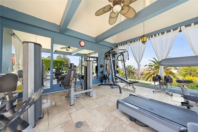 2825 Majestic St, West Covina, CA 91791 - exercise room featuring ceiling fan, beam ceiling, and stone tile floors