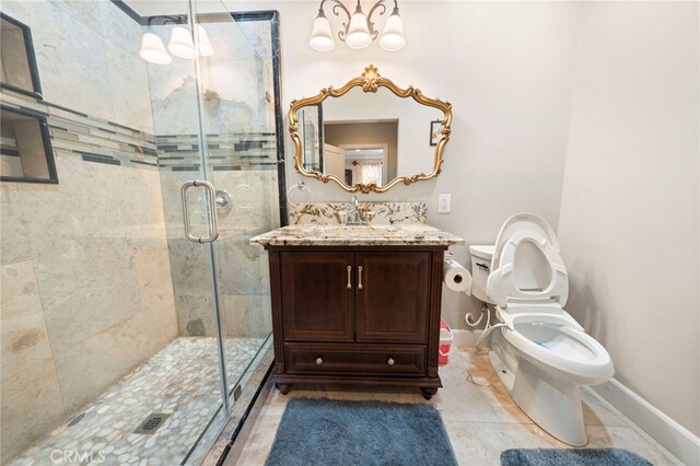 2825 Majestic St, West Covina, CA 91791 - full bath featuring toilet, a stall shower, vanity, baseboards, and a chandelier
