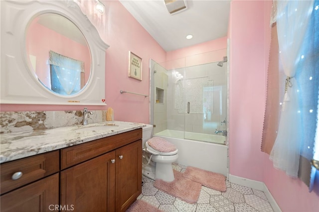 2825 Majestic St, West Covina, CA 91791 - bathroom with toilet, vanity, combined bath / shower with glass door, and baseboards
