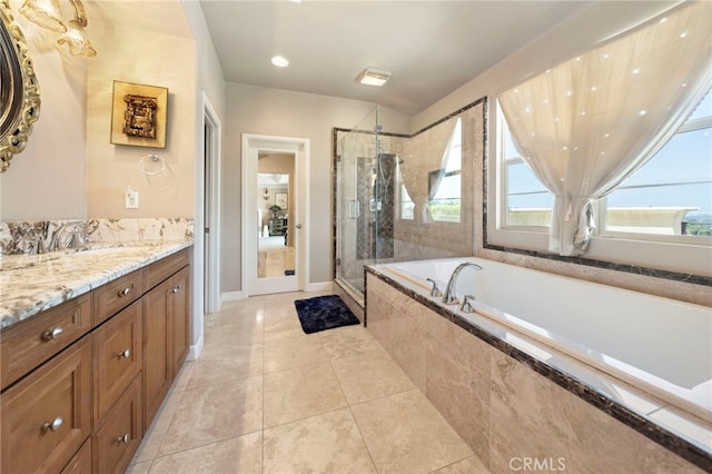 2825 Majestic St, West Covina, CA 91791 - bathroom featuring vanity, a bath, a shower stall, and tile patterned flooring
