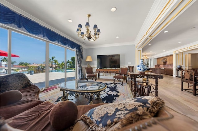 2825 Majestic St, West Covina, CA 91791 - living room featuring a chandelier, wood finished floors, crown molding, and recessed lighting