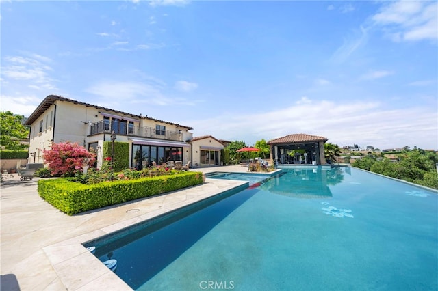 2825 Majestic St, West Covina, CA 91791 - view of swimming pool with an infinity pool, a gazebo, and a patio