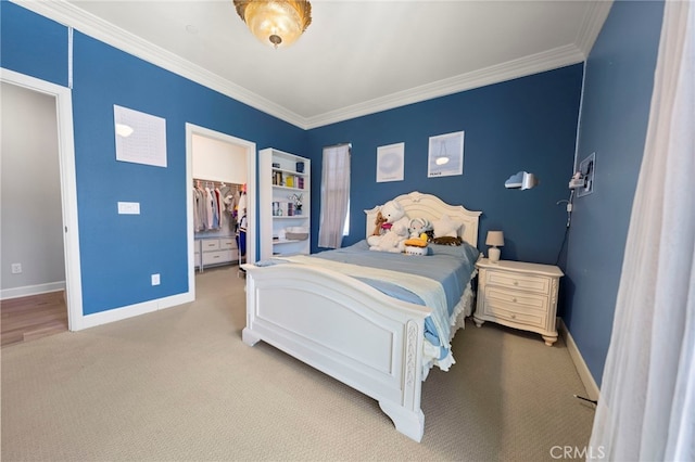 2825 Majestic St, West Covina, CA 91791 - carpeted bedroom featuring ornamental molding, a spacious closet, baseboards, and a closet