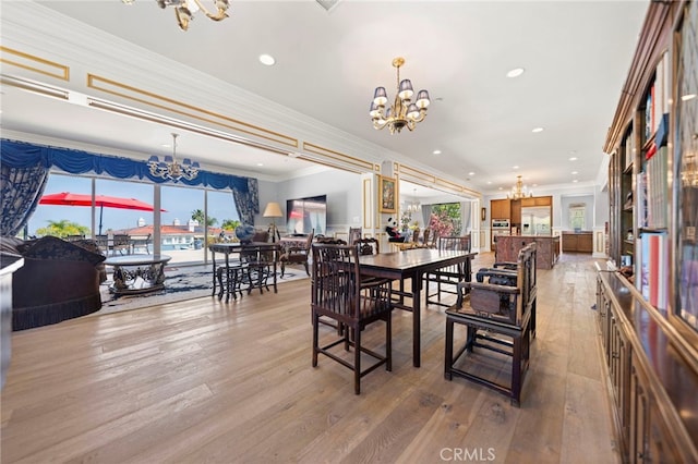 2825 Majestic St, West Covina, CA 91791 - dining space featuring a chandelier, hardwood / wood-style floors, recessed lighting, and crown molding