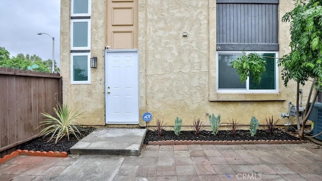 7909 Primrose Ln, Highland, CA 92346 - entrance to property with stucco siding and fence