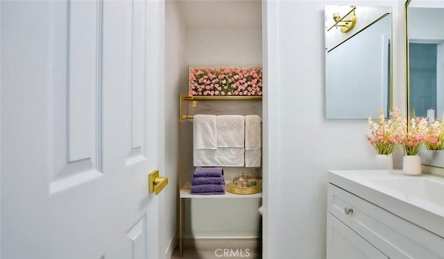7909 Primrose Ln, Highland, CA 92346 - bathroom featuring vanity