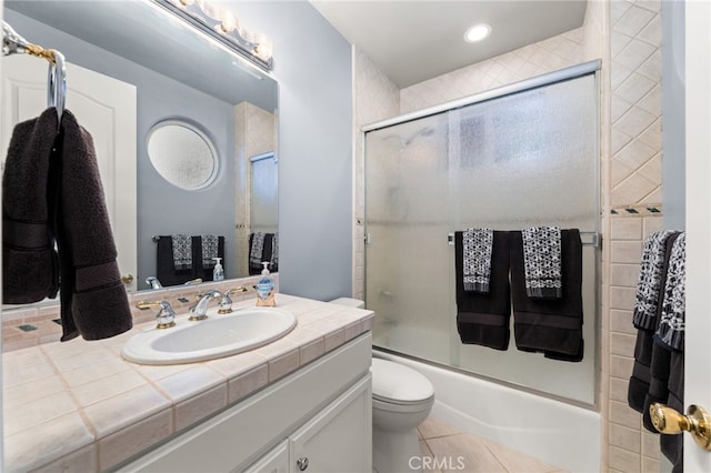 4009 Cerveza Cir, Corona, CA 92881 - bathroom featuring enclosed tub / shower combo, vanity, toilet, tile patterned flooring, and recessed lighting