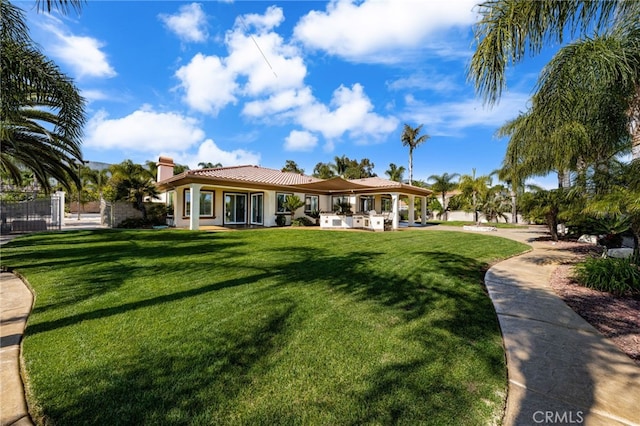 4009 Cerveza Cir, Corona, CA 92881 - back of house featuring a tiled roof, a chimney, and a patio