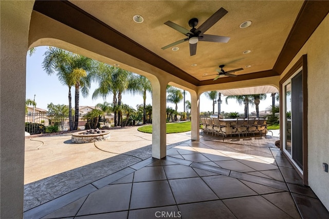 4009 Cerveza Cir, Corona, CA 92881 - view of patio / terrace with fence, a ceiling fan, an outdoor fire pit, and a bar
