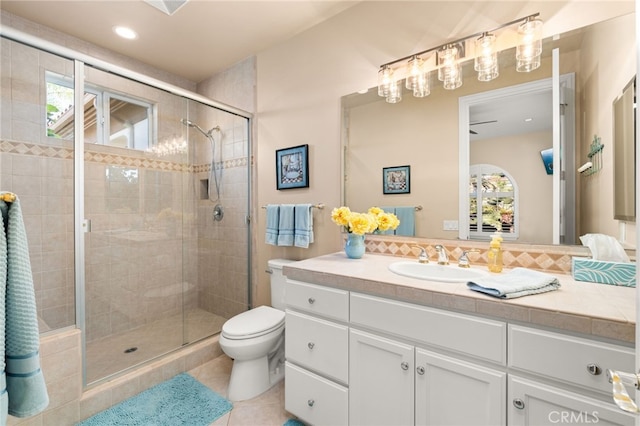 4009 Cerveza Cir, Corona, CA 92881 - full bathroom featuring healthy amount of natural light, a shower stall, tile patterned floors, and toilet