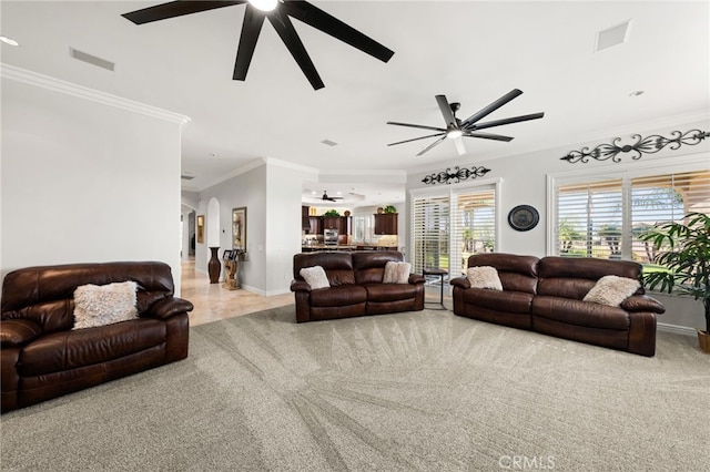 4009 Cerveza Cir, Corona, CA 92881 - living room featuring a ceiling fan, carpet flooring, ornamental molding, arched walkways, and baseboards