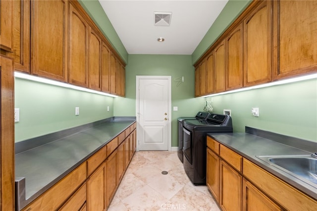 4009 Cerveza Cir, Corona, CA 92881 - laundry room with cabinet space and washing machine and clothes dryer