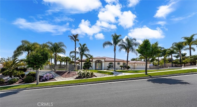 4009 Cerveza Cir, Corona, CA 92881 - mediterranean / spanish home featuring a garage, driveway, and a front yard