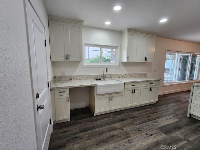 880 S State St, Hemet, CA 92543 - kitchen featuring dark wood-type flooring, recessed lighting, and light stone countertops