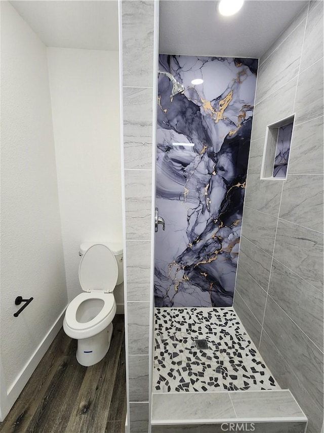 880 S State St, Hemet, CA 92543 - bathroom featuring a marble finish shower and wood finished floors