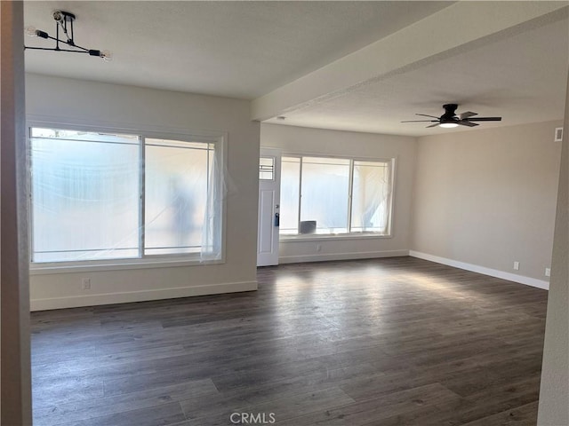 880 S State St, Hemet, CA 92543 - empty room featuring dark wood-style flooring and a ceiling fan