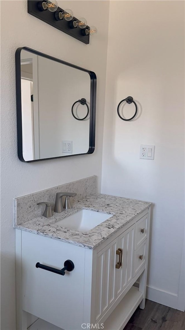880 S State St, Hemet, CA 92543 - bathroom with vanity and wood finished floors