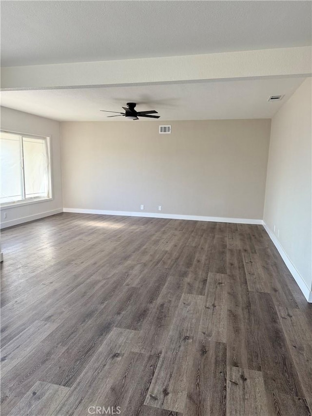 880 S State St, Hemet, CA 92543 - empty room with ceiling fan and dark wood finished floors