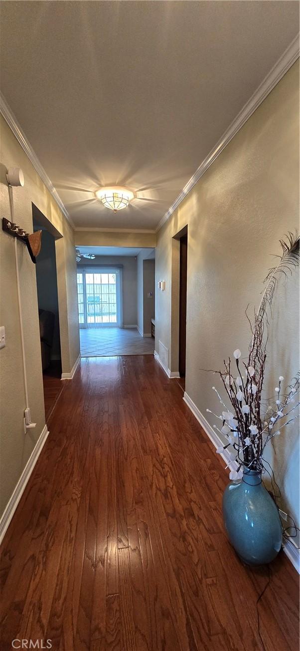 3349 Brookridge Rd, Duarte, CA 91010 - hallway with dark wood-style floors, ornamental molding, and baseboards