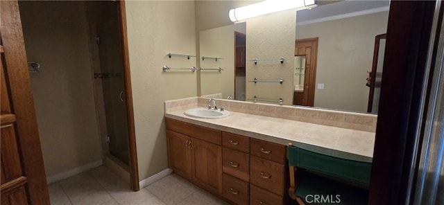 3349 Brookridge Rd, Duarte, CA 91010 - bathroom with tile patterned floors, vanity, crown molding, a shower stall, and baseboards