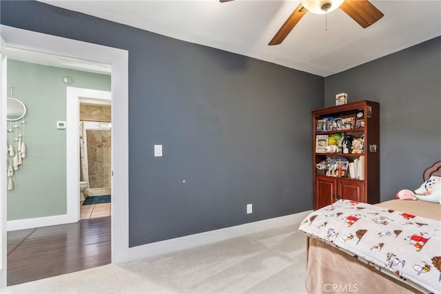 21114 Martin St, Carson, CA 90745 - carpeted bedroom featuring baseboards, ceiling fan, and ensuite bath