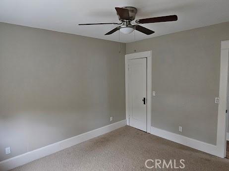 4107 37th St, San Diego, CA 92105 - unfurnished room with a ceiling fan, carpet flooring, and baseboards
