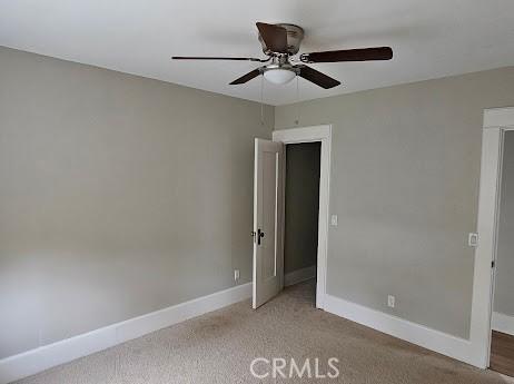 4107 37th St, San Diego, CA 92105 - unfurnished bedroom featuring baseboards, carpet flooring, and a ceiling fan