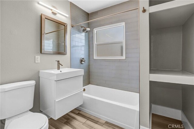 4107 37th St, San Diego, CA 92105 - bathroom featuring vanity, bathtub / shower combination, and wood finished floors