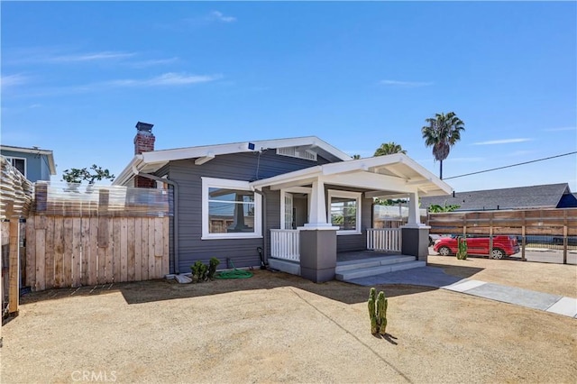 4107 37th St, San Diego, CA 92105 - view of front of home featuring a chimney and a porch