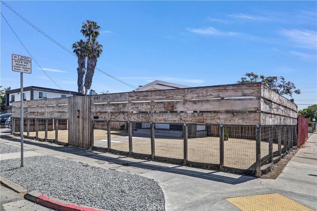 4107 37th St, San Diego, CA 92105 - view of building exterior featuring a fenced front yard