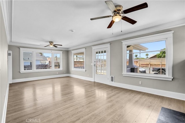 4107 37th St, San Diego, CA 92105 - unfurnished living room featuring crown molding, a ceiling fan, and wood finished floors