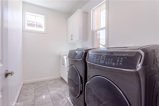 20621 Chestnut Cir, Porter Ranch, CA 91326 - clothes washing area featuring separate washer and dryer, cabinet space, and baseboards