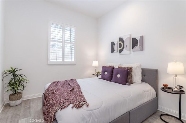 20621 Chestnut Cir, Porter Ranch, CA 91326 - bedroom featuring baseboards and wood finished floors