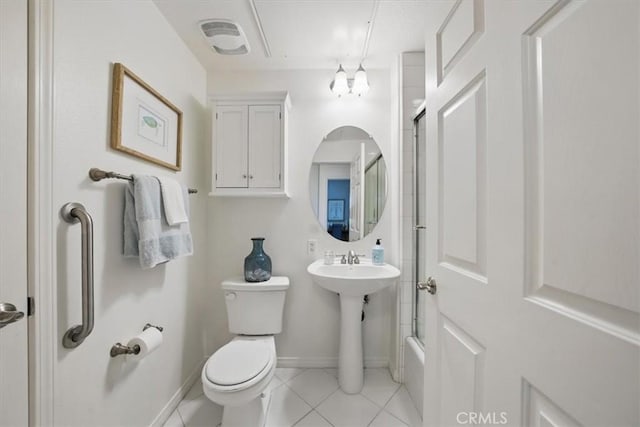 21345 Hawthorne Blvd Unit 126, Torrance, CA 90503 - full bathroom with toilet, baseboards, tile patterned floors, and bath / shower combo with glass door