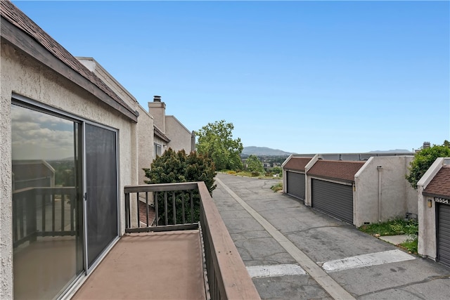 balcony featuring a mountain view