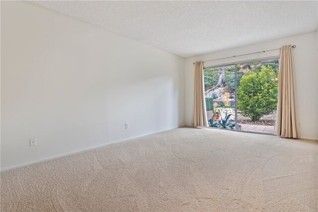 15555 Crestview Ln Unit 94, Granada Hills, CA 91344 - carpeted empty room featuring a textured ceiling and baseboards