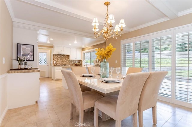 dining room with a chandelier, light tile patterned floors, ornamental molding, and beam ceiling