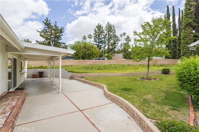 view of yard with a patio area