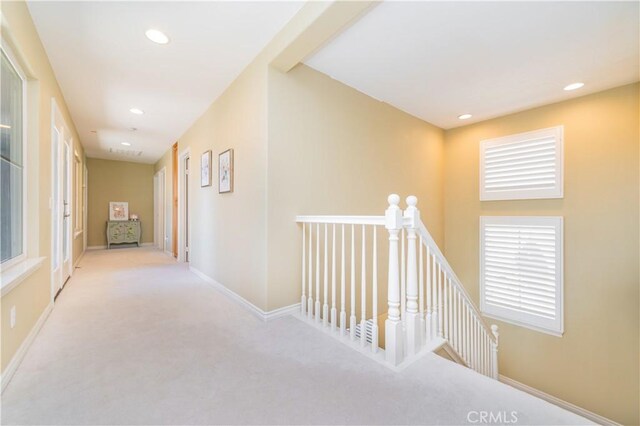 12538 Old Port Ct, Rancho Cucamonga, CA 91739 - corridor with an upstairs landing, recessed lighting, carpet flooring, and baseboards