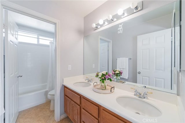 12538 Old Port Ct, Rancho Cucamonga, CA 91739 - full bathroom featuring toilet, double vanity, shower / bath combo, and tile patterned floors