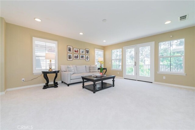 12538 Old Port Ct, Rancho Cucamonga, CA 91739 - carpeted living area featuring healthy amount of natural light, baseboards, and recessed lighting